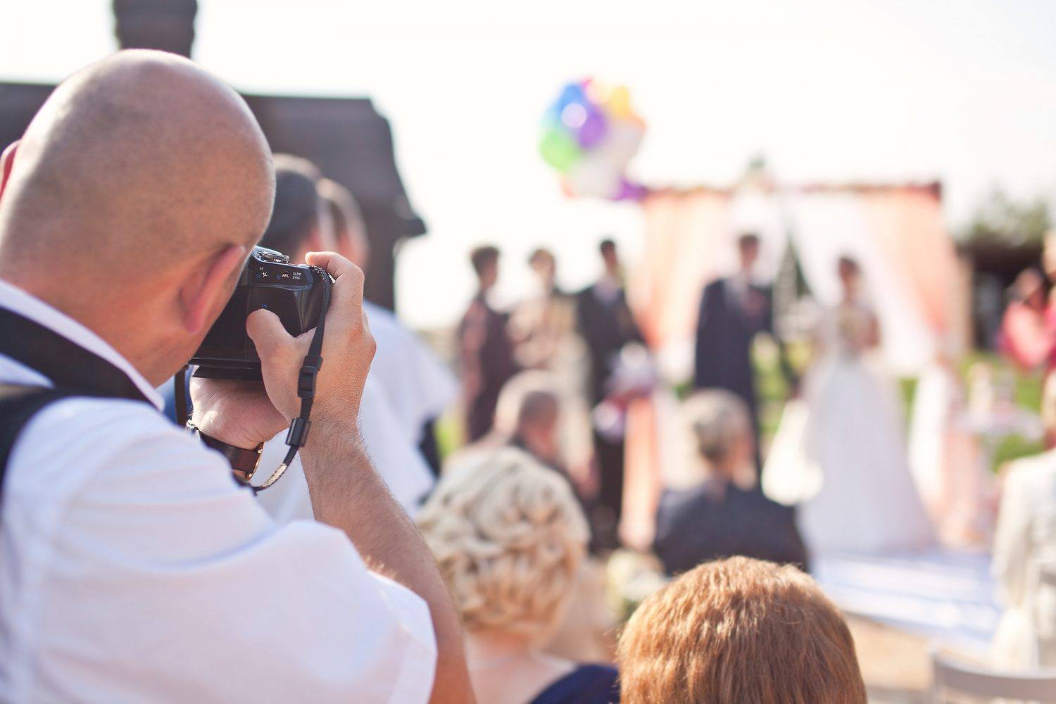 photo booth hire - taking photographs of groom and bride
